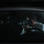 Twin City News photographing from car