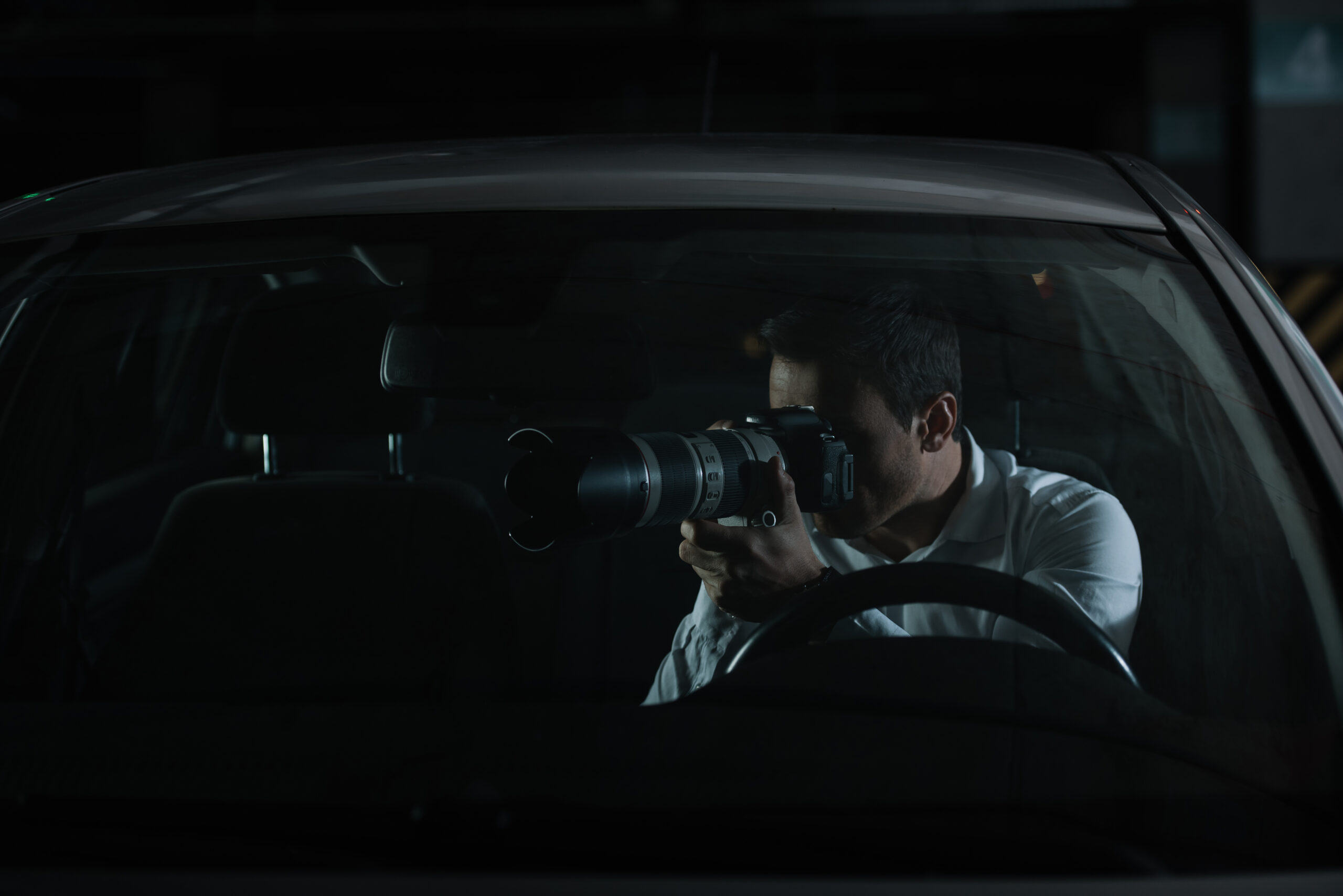 Twin City News photographing from car